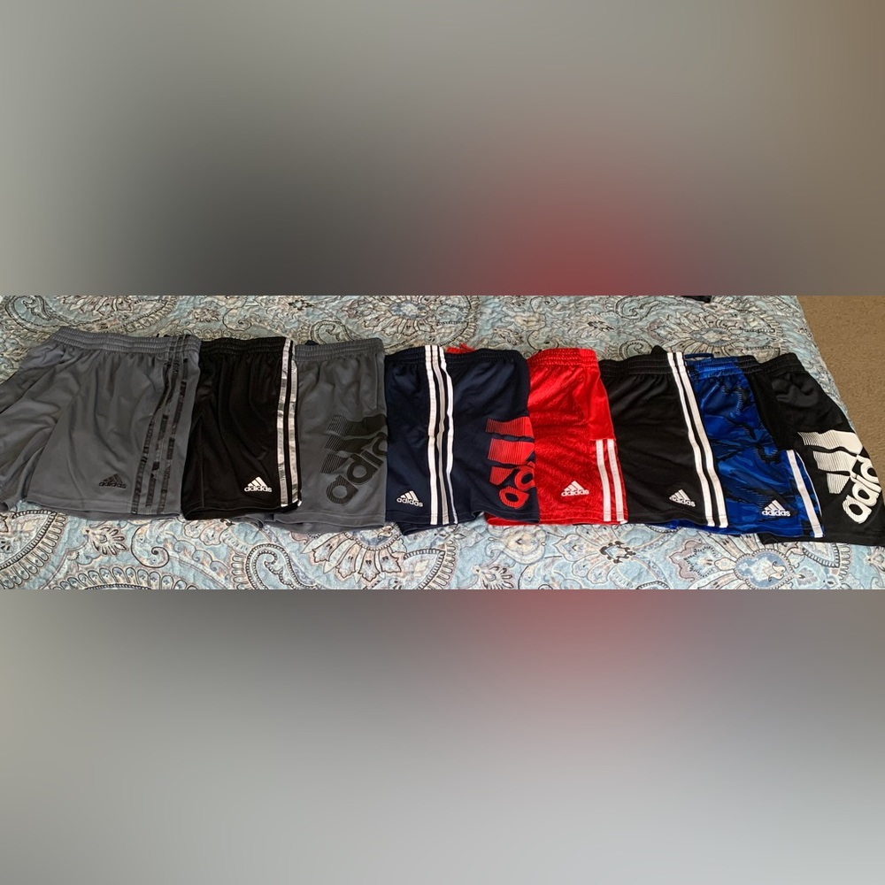 Excellent condition! 9 pair of Adidas boys shorts. Size 10-12.